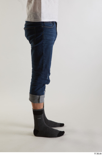 Arvid  1 blue jeans casual dressed leg side view…